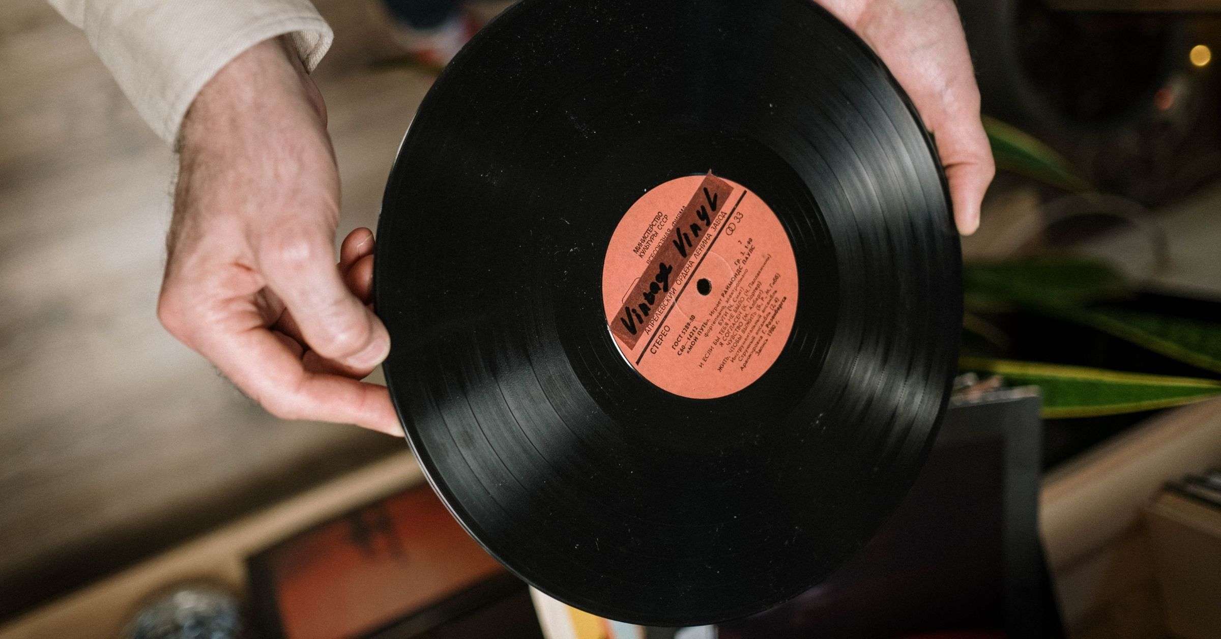 Man holding a vinyl record