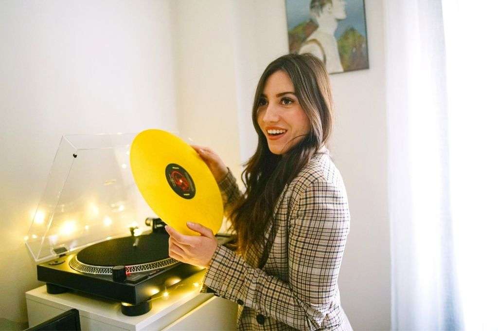 Woman holding a vinyl record