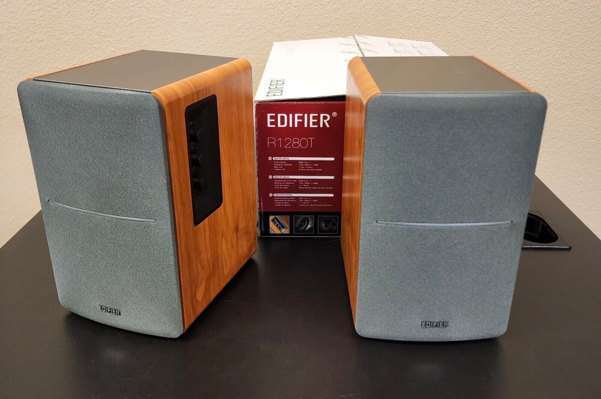 Edifier R1280T speakers in front of box