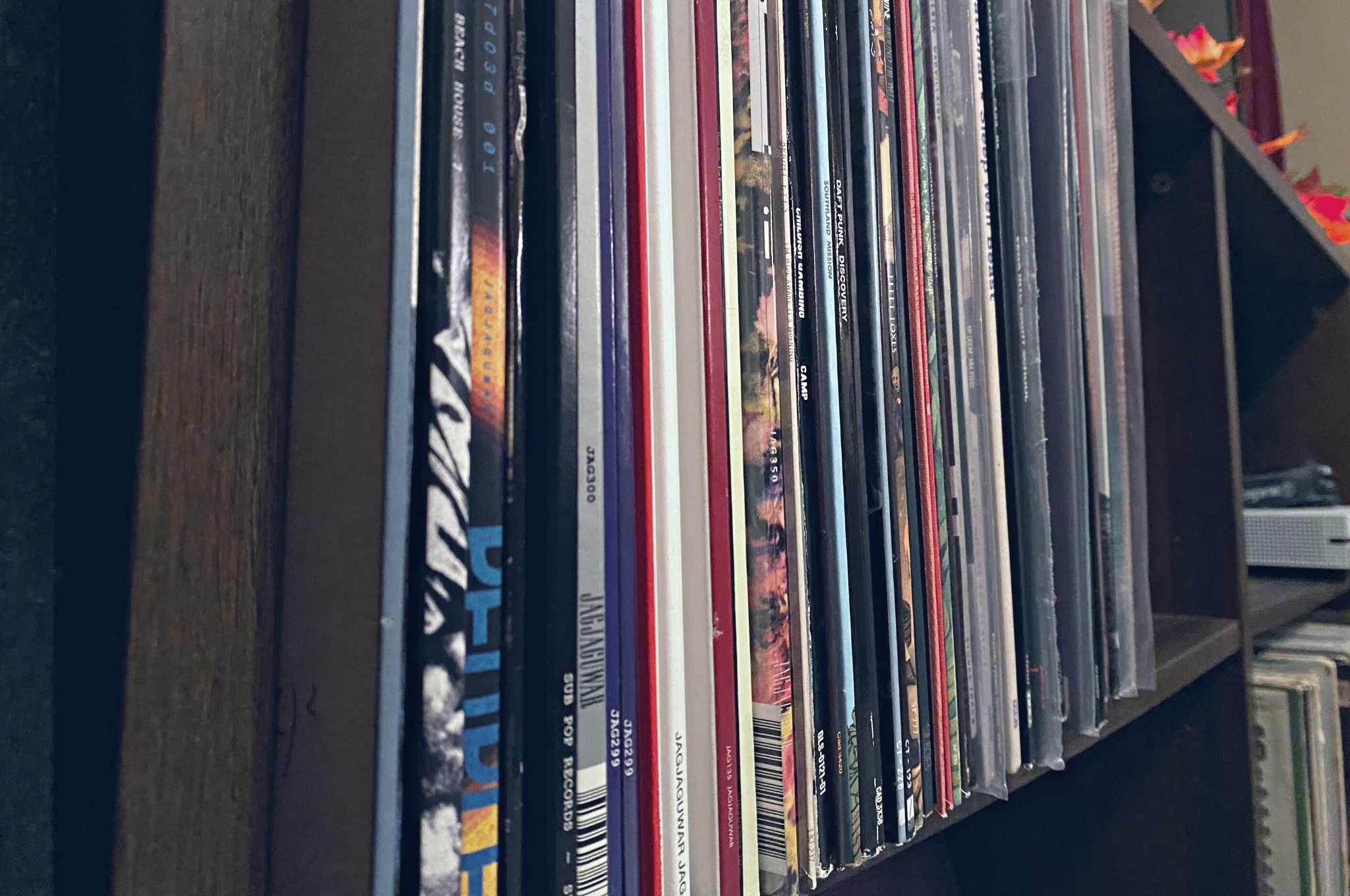 Records neatly stored on a shelf